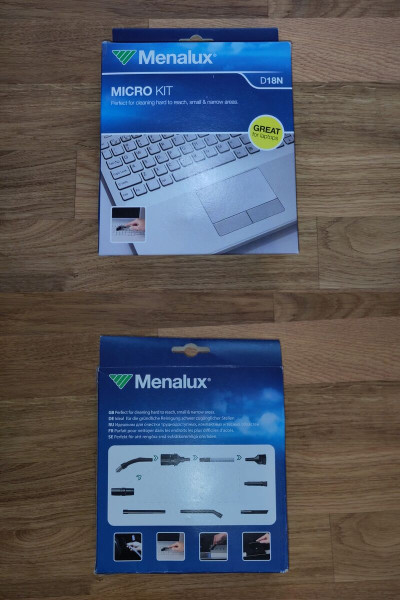 Ein Staubsaugermicrodüsensatz bestehend aus mehreren Bürsten, Adaptern und einem zusätzlichen Schlauch.